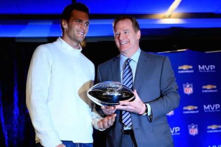 PHOENIX, AZ - FEBRUARY 02:  (L-R) Tom Brady of the New England Patriots with NFL Commissioner Roger Goodell and the Super Bowl XLIX MVP trophy during a press conference folowing the Patriots Super Bowl win over the Seattle Seahawks on February 2, 2015 in Phoenix, Arizona.  (Photo by Jamie Squire/Getty Images)