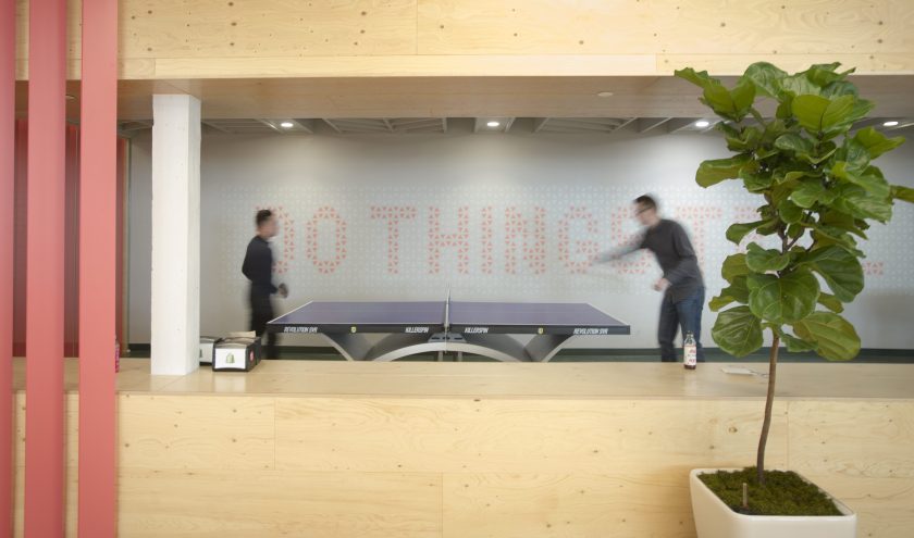 Employees of Shopify Inc. play ping-pong at their company's office space in Toronto, Ontario, Canada, on March 13, 2015. Rents for brick-and-beam real estate in the city's east end rose 26 percent to C$20.62 ($16.13) a square foot from 2007 and were up 49 percent in the west end, according to data compiled by CBRE Group Inc. (Kevin Van Paassen/Bloomberg via Getty Images)