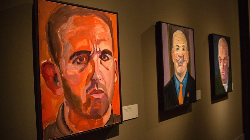 Paintings of wounded US military veterans painted by former US President George W. Bush hang in "Portraits of Courage", a new exhibit at the George W. Bush Presidential Library and Museum in Dallas, Texas, on February 28, 2017. (Laura Buckman/AFP/Getty Images)