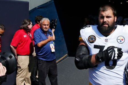 Alejandro Villanueva #78 of the Pittsburgh Steelers stands by himself in the team's tunnel during the national anthem prior to a game against the Chicago Bears at Soldier Field on September 24, 2017 in Chicago, Illinois. Villanueva, a former Army Ranger who served terms in Afghanistan, was the lone Steeler to appear during the anthem. The Bears won 23-17 in overtime. (Photo by Joe Robbins/Getty Images)