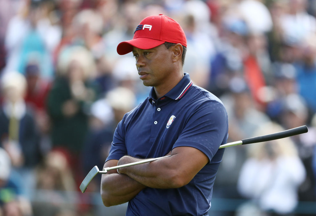 PARIS, FRANCE - SEPTEMBER 30:  Tiger Woods of the United States reacts during singles matches of the 2018 Ryder Cup at Le Golf National on September 30, 2018 in Paris, France.  (Photo by Jamie Squire/Getty Images)