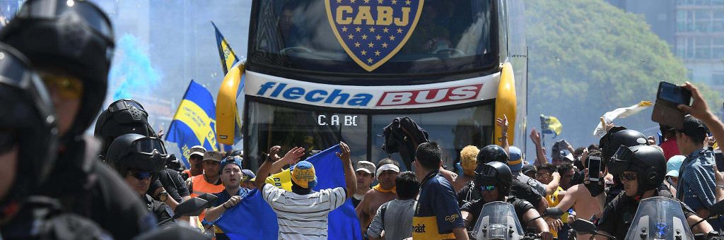 TOPSHOT - Picture released by Telam showing the Boca Juniors team bus leaving their hotel on the way to the Monumental stadium in Buenos Aires, on November 24, 2018 to play the second leg match of the all-Argentine Copa Libertadores final against River Plate, before it was attacked y River fans. (Photo by JOSE ROMERO/AFP/Getty Images)