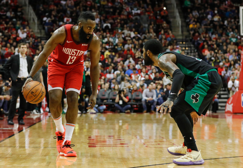 HOUSTON, TX - DECEMBER 27:  James Harden #13 of the Houston Rockets controls the ball defended by Kyrie Irving #11 of the Boston Celtics in the second half at Toyota Center on December 27, 2018 in Houston, Texas.   (Photo by Tim Warner/Getty Images)