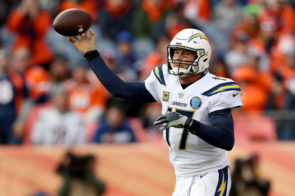 Quarterback Philip Rivers #17 of the Los Angeles Chargers throws against the Denver Broncos at Broncos Stadium at Mile High on December 30, 2018 in Denver, Colorado. (Photo by Matthew Stockman/Getty Images)