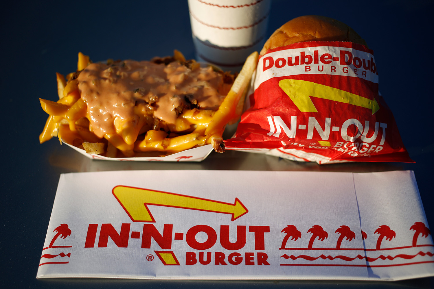A spread of burgers and fries from In-N-Out.