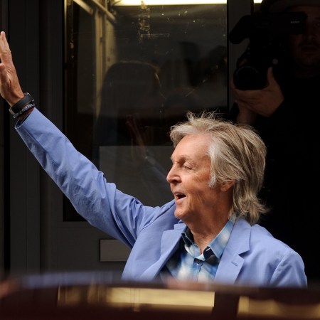 Paul McCartney waving