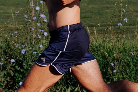 A model running in Tracksmith's Twilight Shorts.
