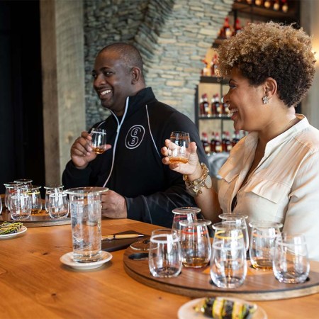 Armond and Samara Davis of the Black Bourbon Society, tasting whiskey. Their collaboration with Maker's Mark is a standout 2021 bourbon.