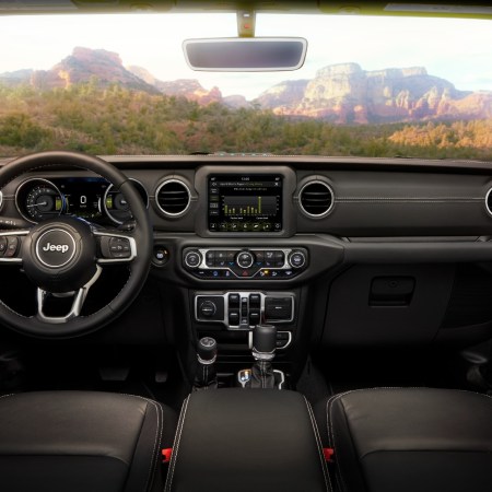 A view from the inside of a Jeep Wrangler looking out through the Gorilla Glass windshield