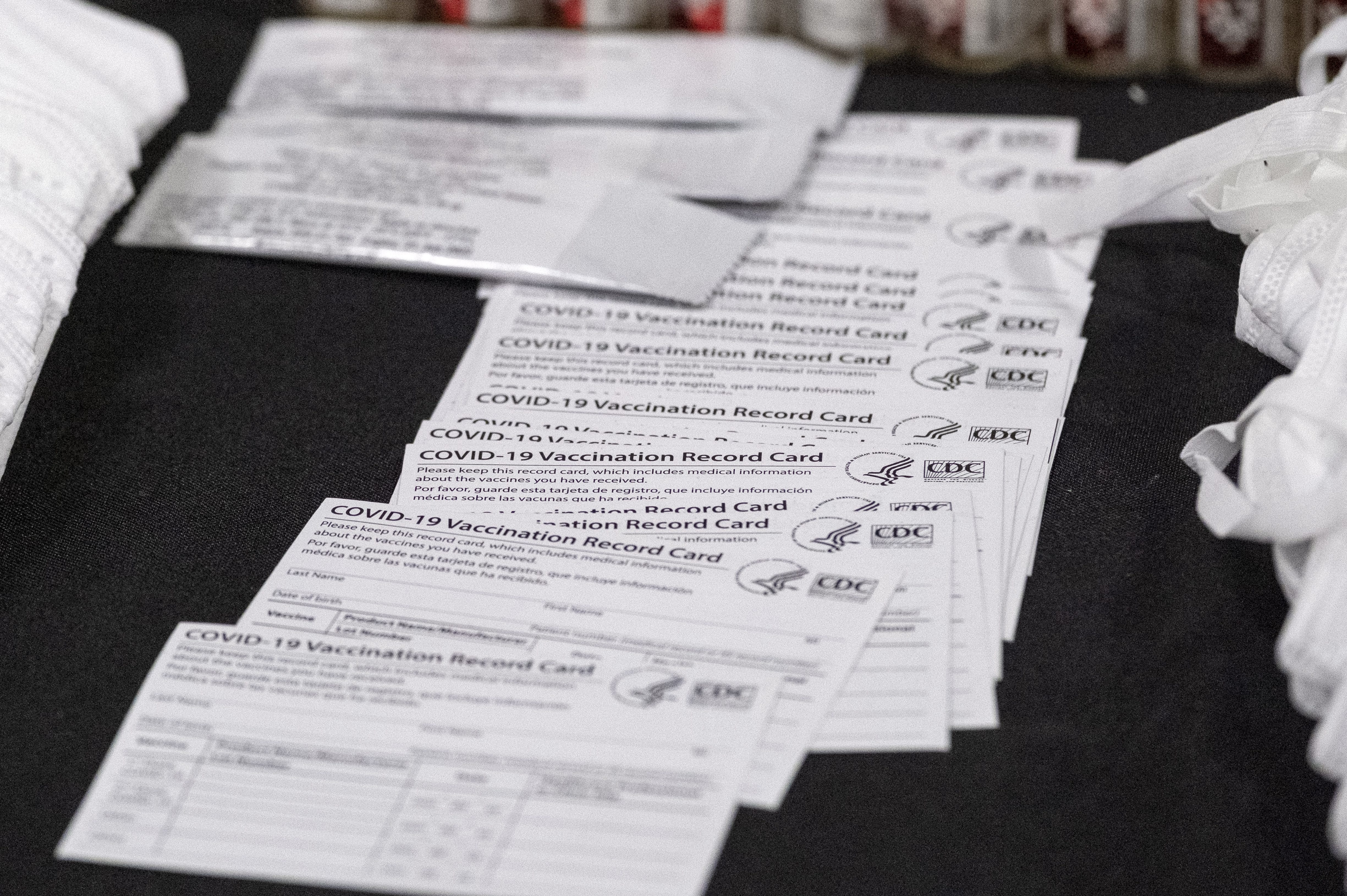 U.S. Customs and Border Protection puts seized counterfeit Covid-19 vaccination cards on display.