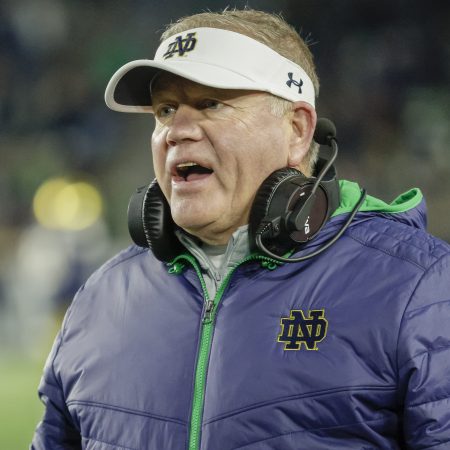 Brian Kelly coaches against the Georgia Tech Yellow Jackets at Notre Dame Stadium