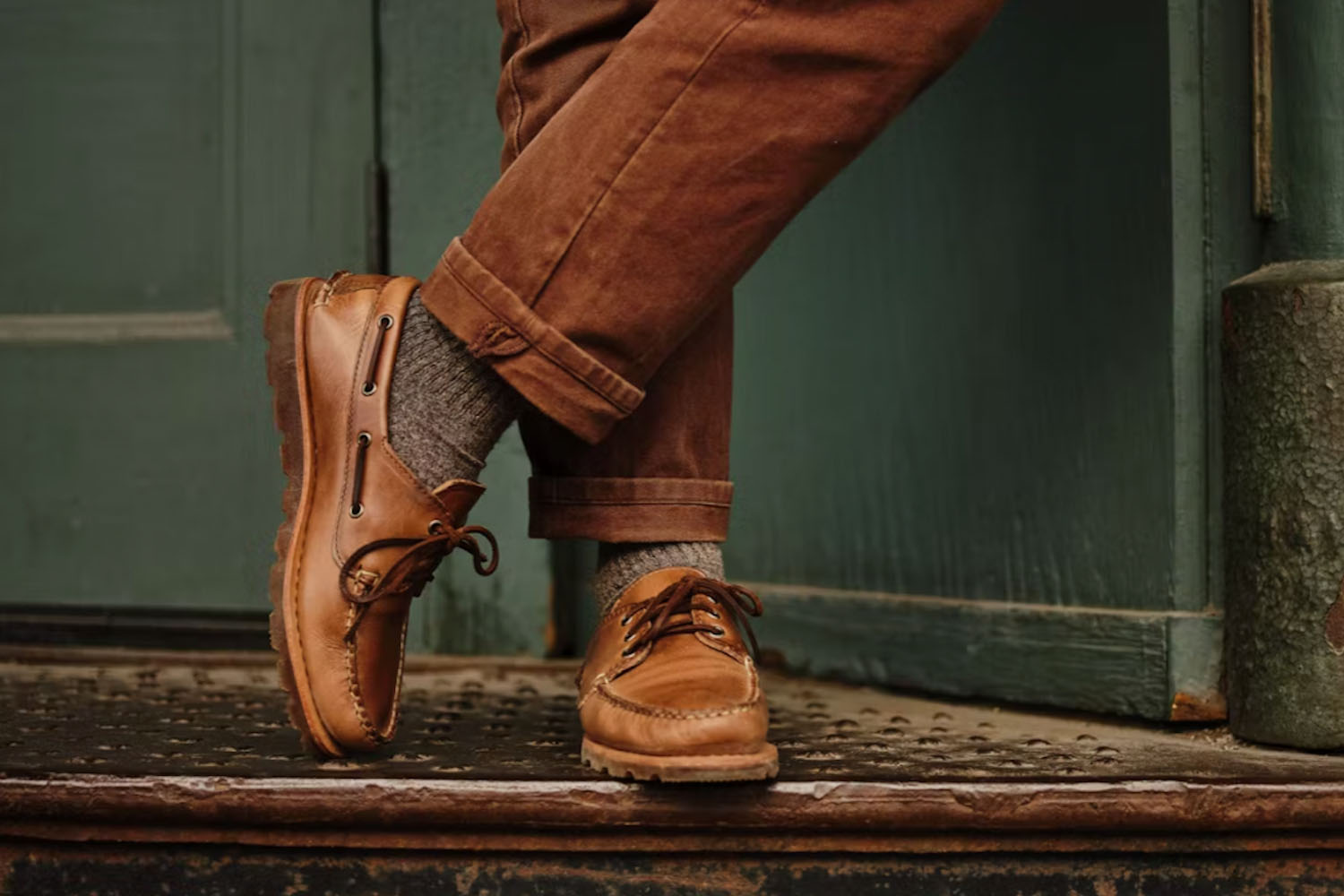 a model in a pair of Rancourt & Co The Coggins "Sawtooth" Rugged Moccasin shoes