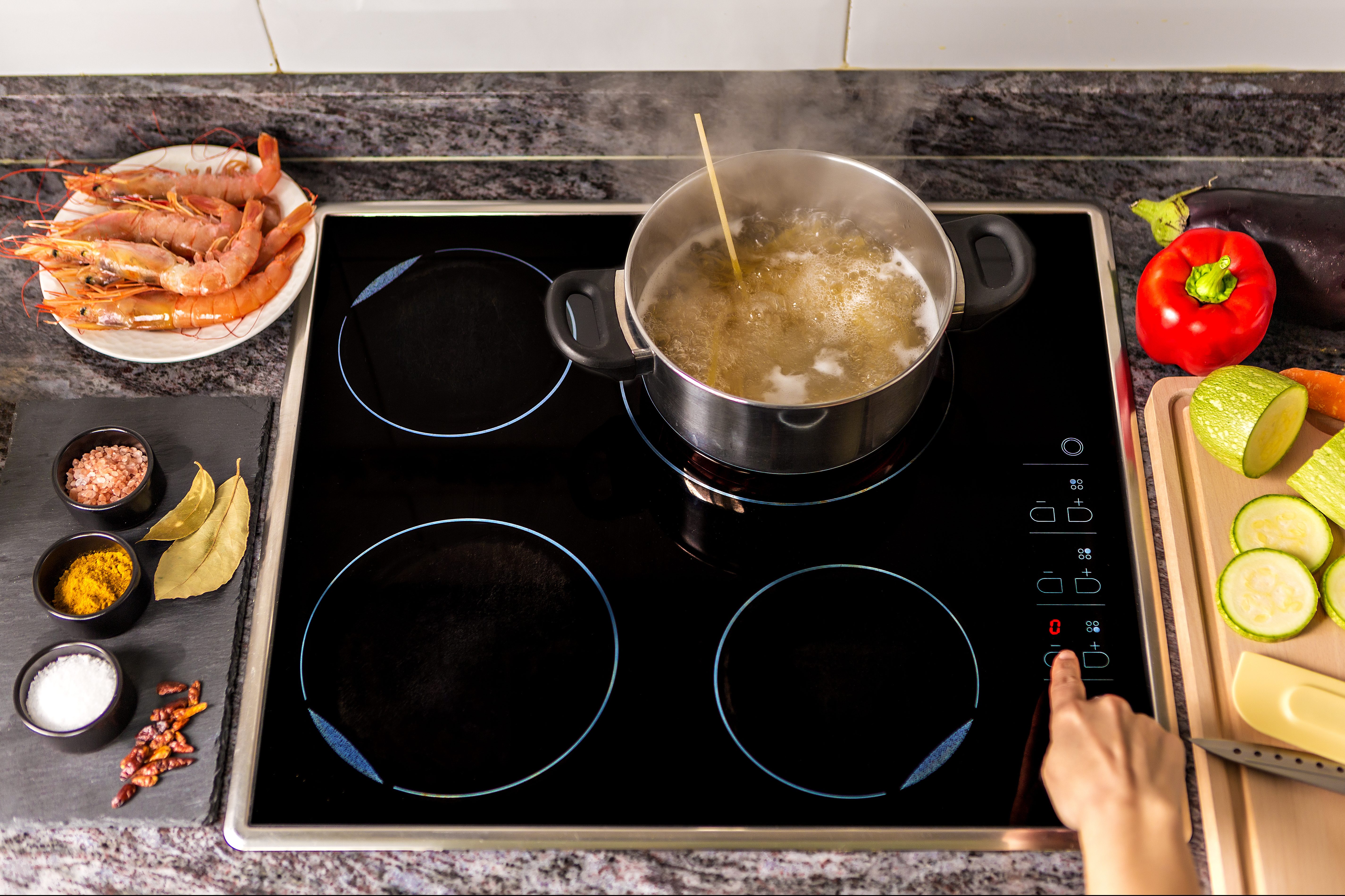 What is induction cooking and is it better than electric or gas? - Reviewed