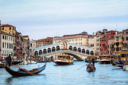 Rialto bridge on the Grand Canal at sunset