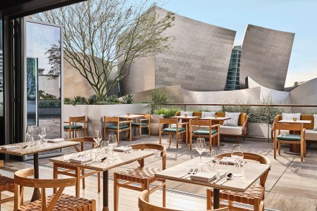 Outdoor seating at Jose Andres's San Laurel, situated beside the Walt Disney Concert Hall.