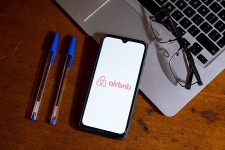 Airbnb logo on phone