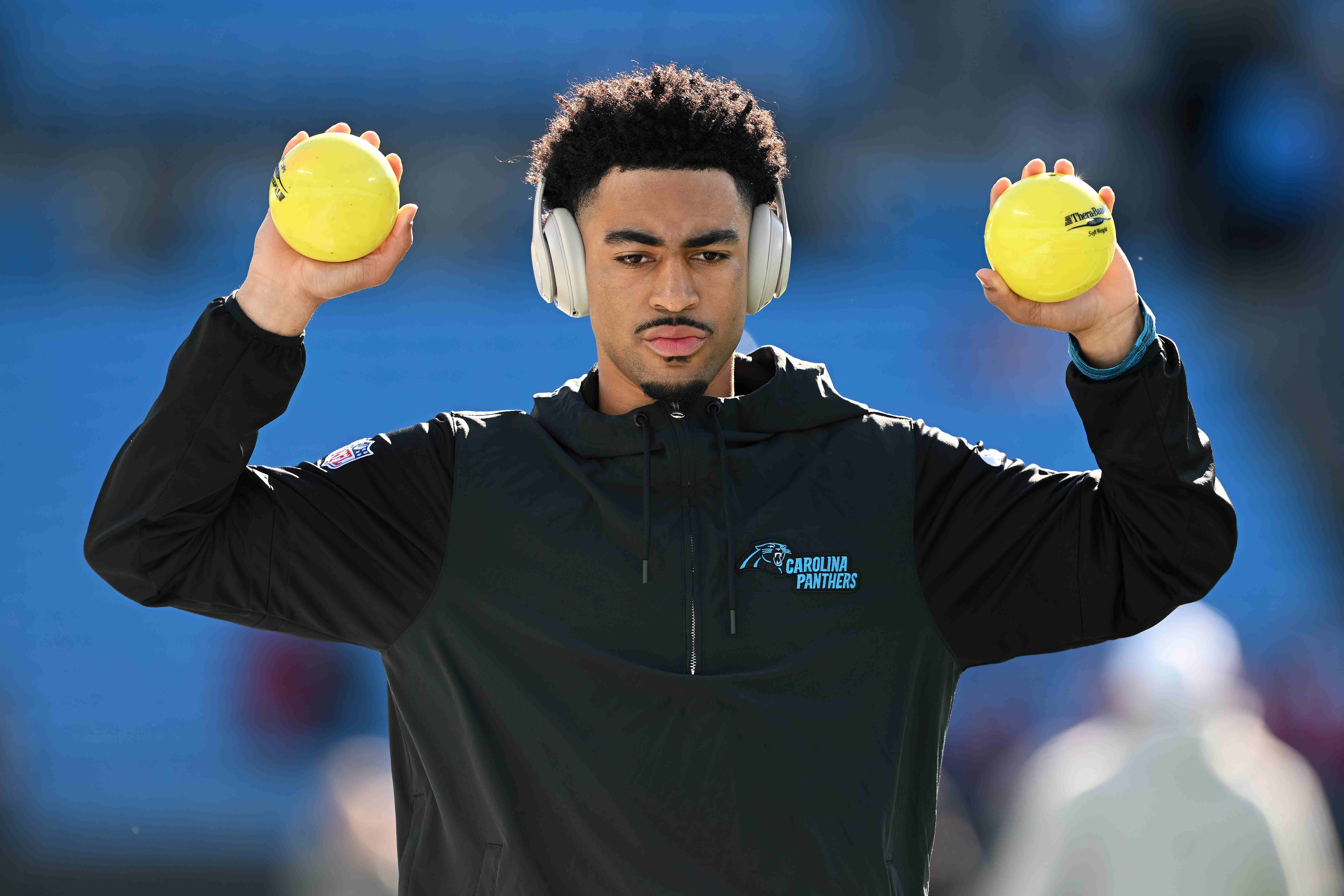 Bryce Young of the Panthers warms up.