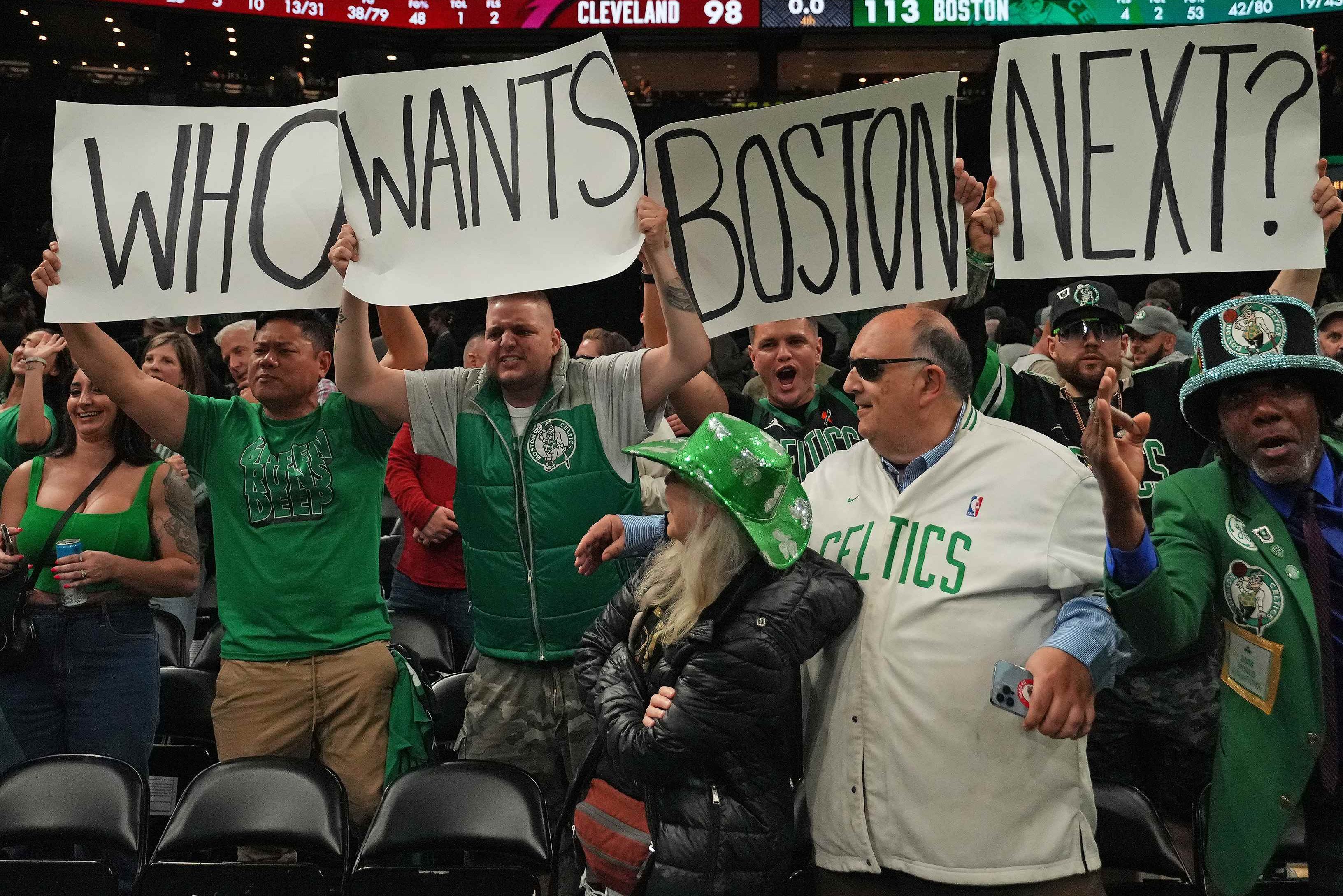 Boston Celtics fans celebrate during a game against the Cavaliers.