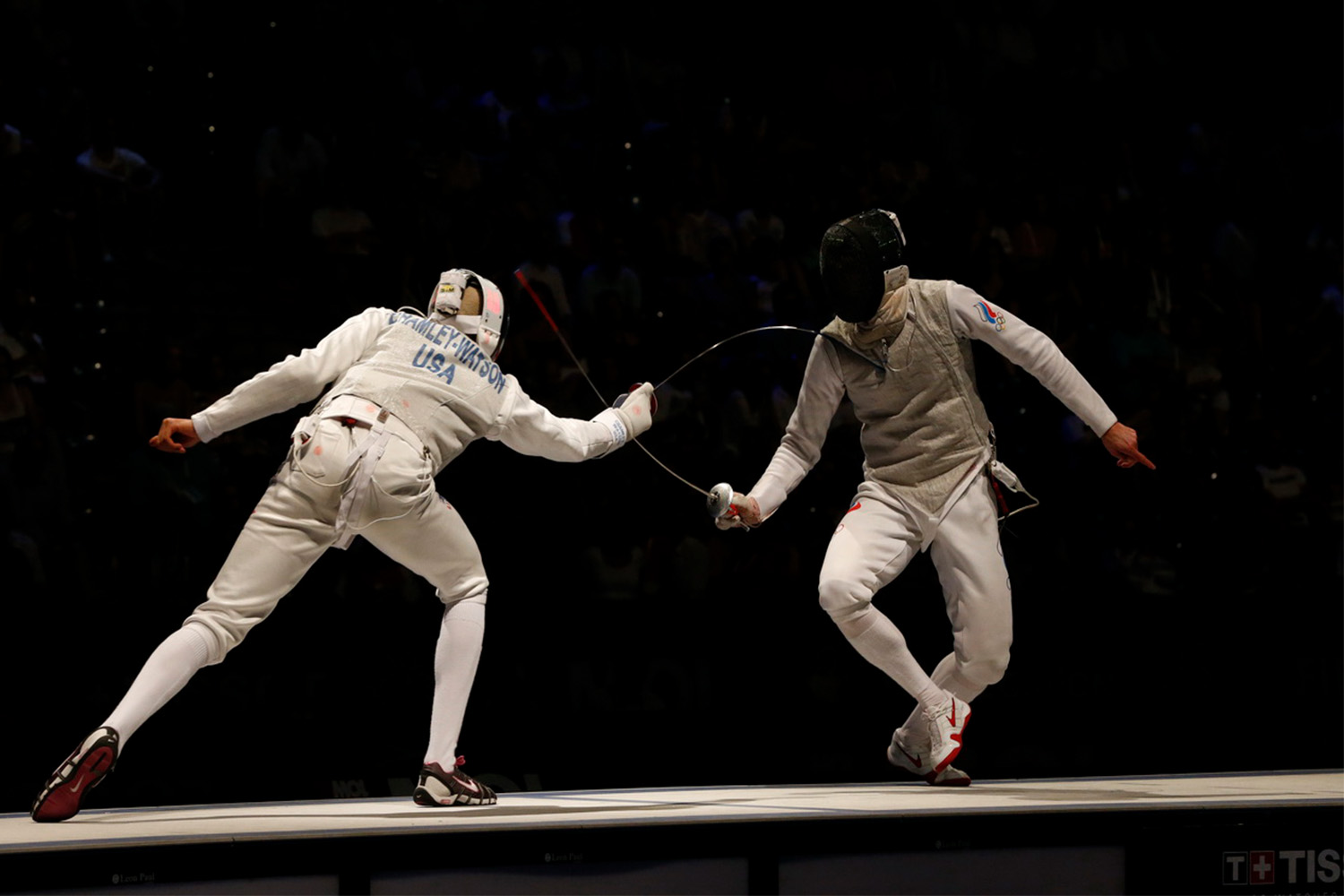 Miles Chamley-Watson fencing against an opponent.