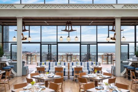 an indoor rooftop restaurant with beautiful views of lake michigan