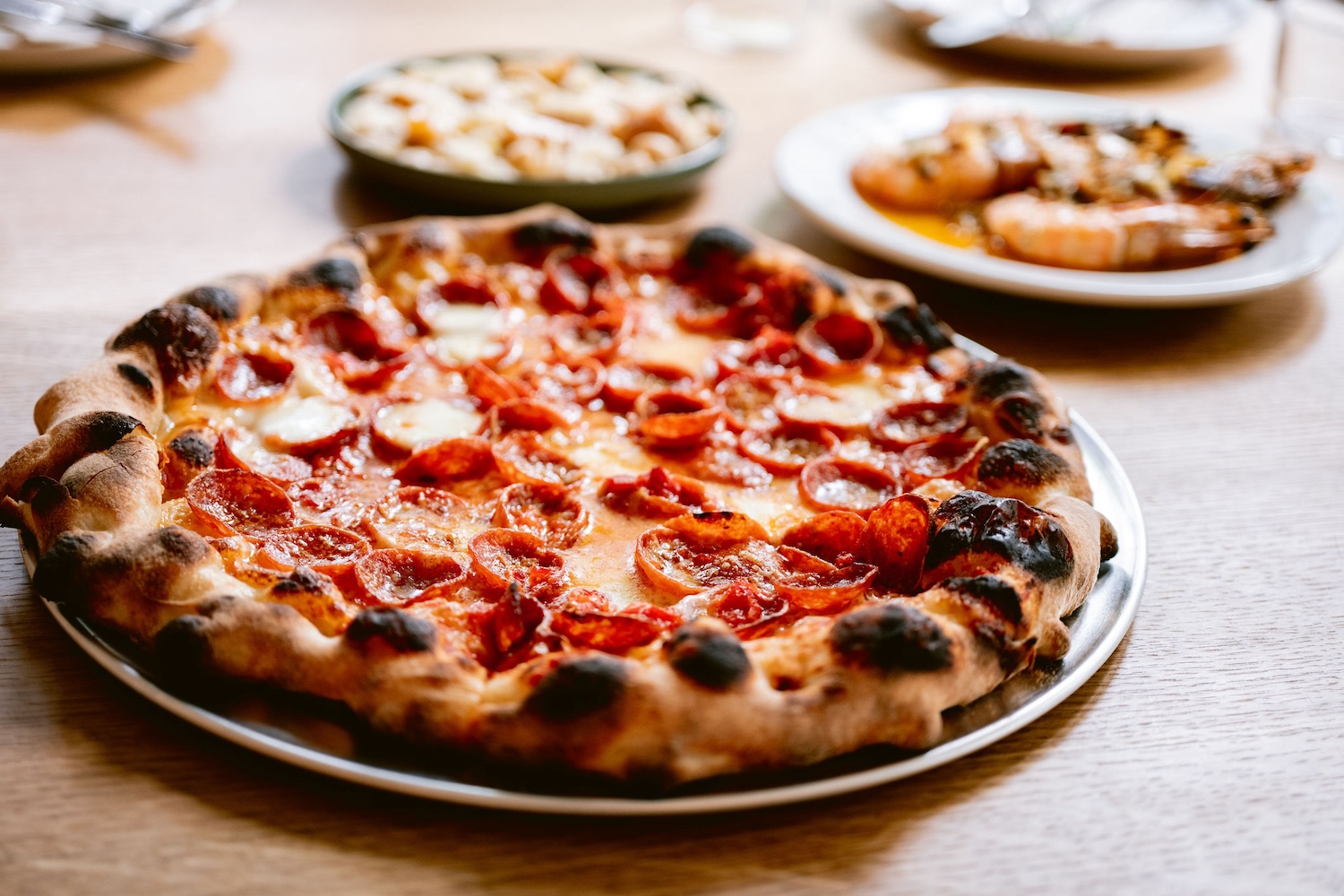 A pepperoni pie from Flour and Water Pizzeria. Also try the cacio e pepe pizza.