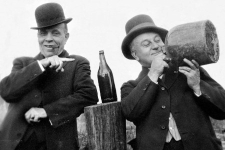 Two men with a jug of moonshine, ca. 1915