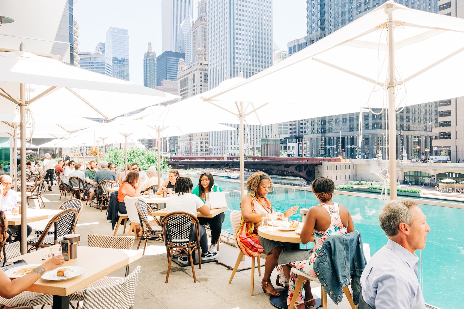 RPM Seafood's open-air patio, set beside the Chicago River, in the heart of Downtown