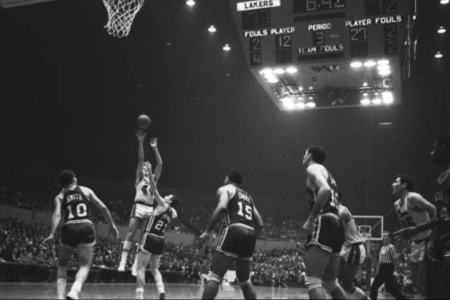 27 year old Jerry West makes a jump shot against the Cincinnati Royals (1965)