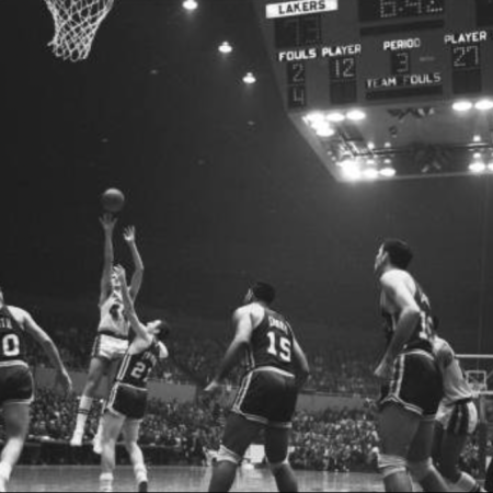 27 year old Jerry West makes a jump shot against the Cincinnati Royals (1965)