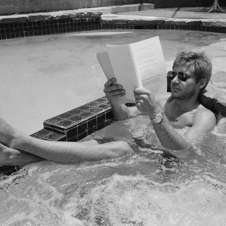 A shot of Harrison Ford reading a script in a hot tub.