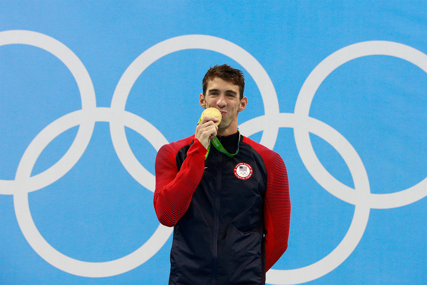 Michael Phelps kissing an Olympic gold medal. Would the record-breaking swimmer even medal in today's Olympics?