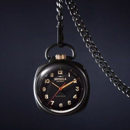 Pocket watch on dark background