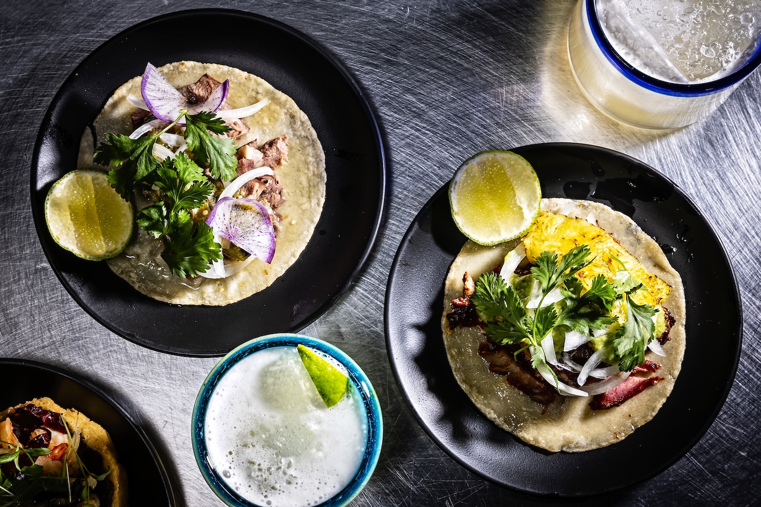 he Tongue, left, and Pork Tacos with Mezcal Margaritas at Chicatana Restaurant