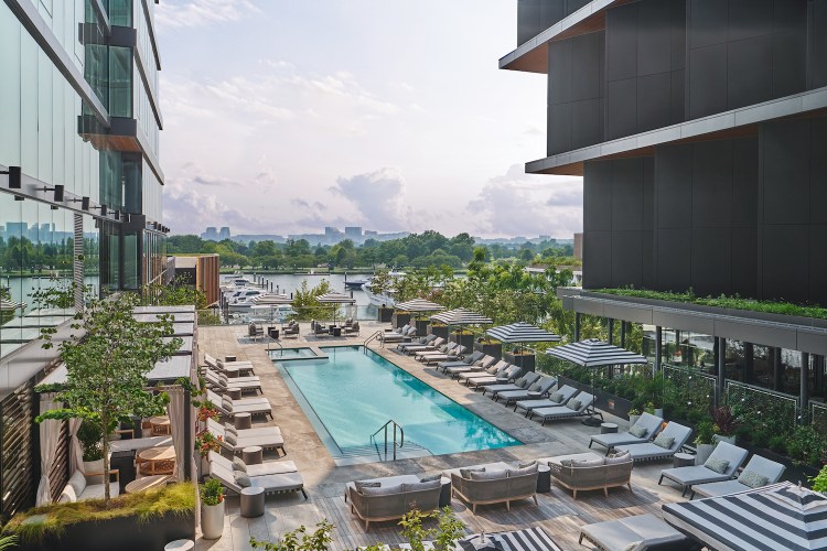 Perched above the Wharf neighborhood, Pendry's pool deck offers spectacular views of the Potomac