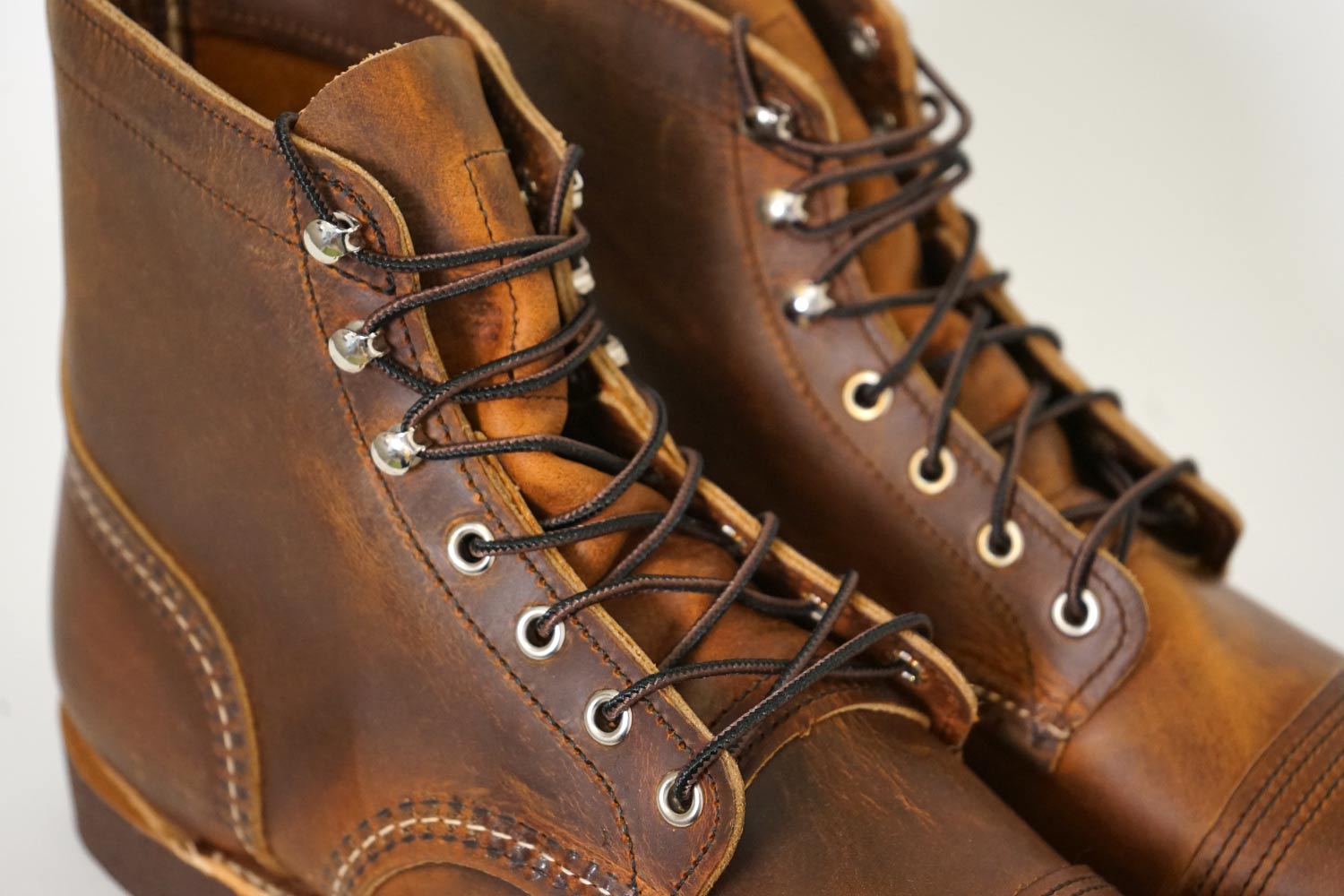 The laces on a pair of Red Wing boots made in Minnesota