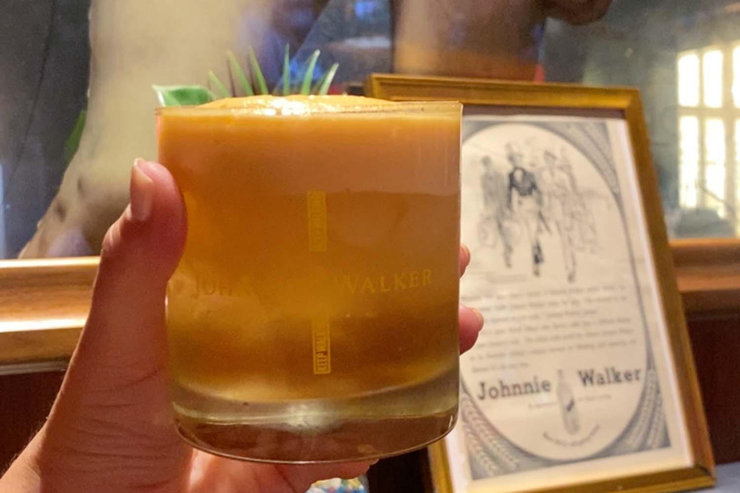 A Johnnie Walker cocktail with a carrot cream cheese foam