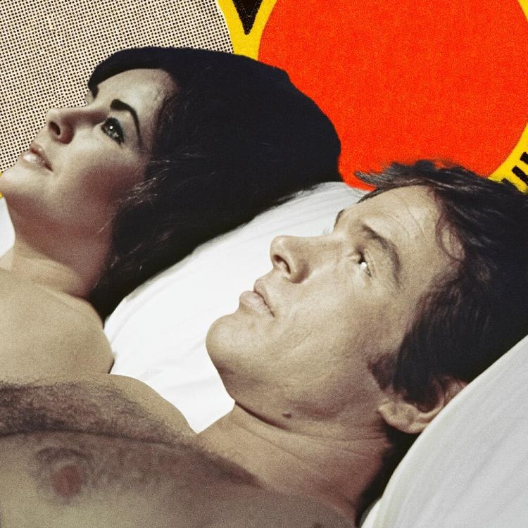 Warren Beatty and Elizabeth Taylor laying in bed in the film The Only Game in Town