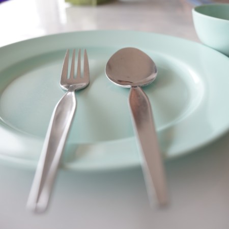 Fork and spoon on plate