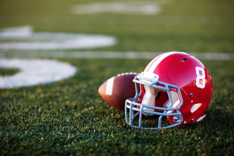 Football and football helmet