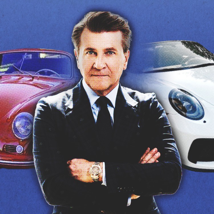 "Shark Tank" co-host Robert Herjavec in front of two of his cars, a Porsche 356 A and a 2019 Porsche 911 Speedster