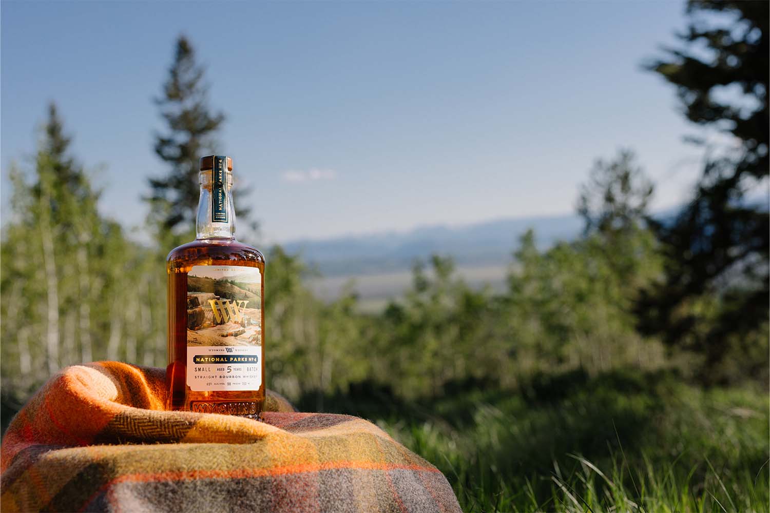 Wyoming Whiskey bottle sitting outside