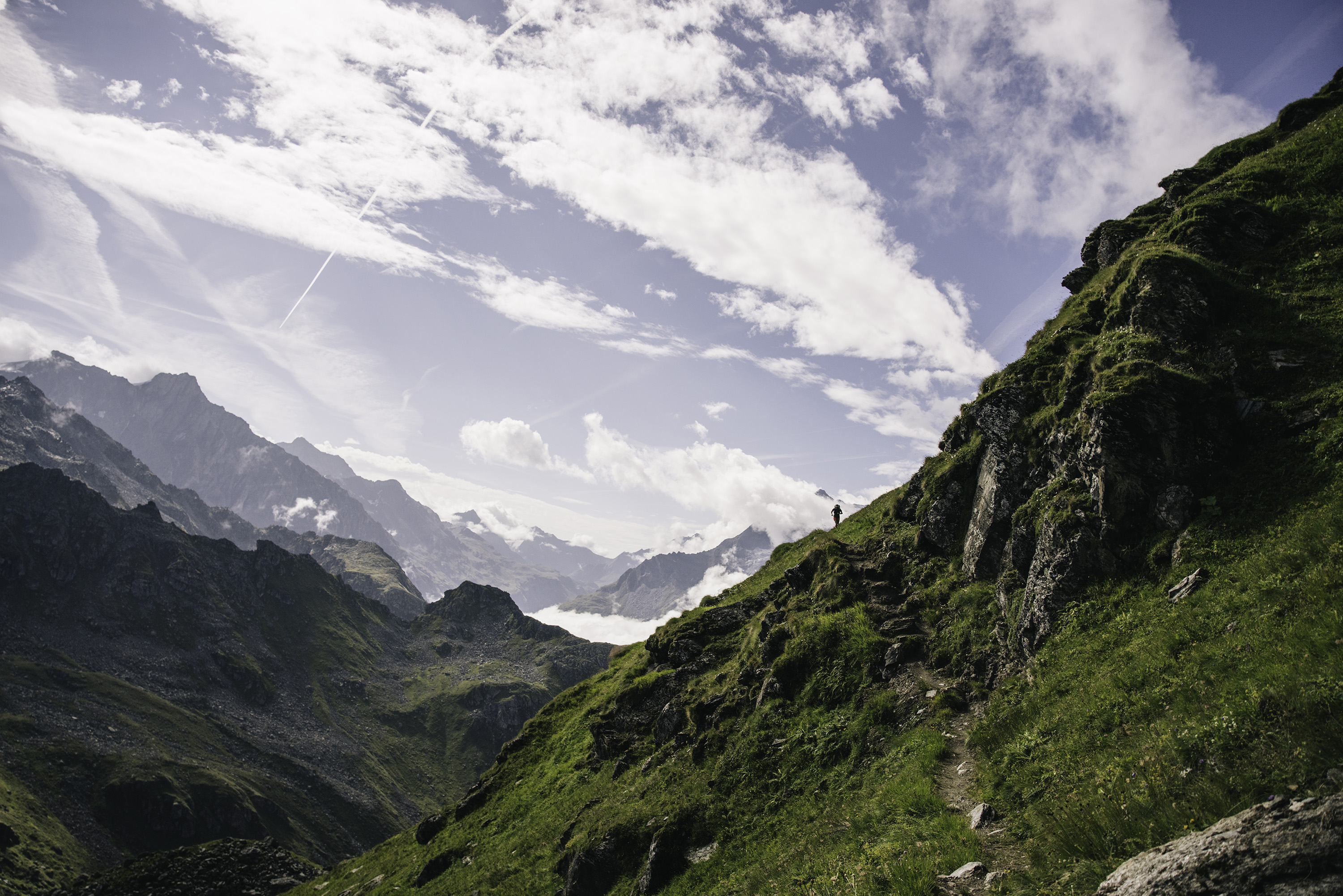 Trail runner Andy Cochrane running a hut-to-hut in the Swiss Alps