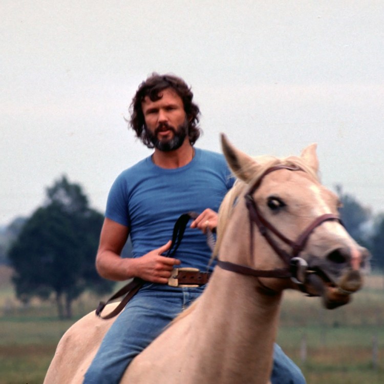 Kris Kristofferson on horseback