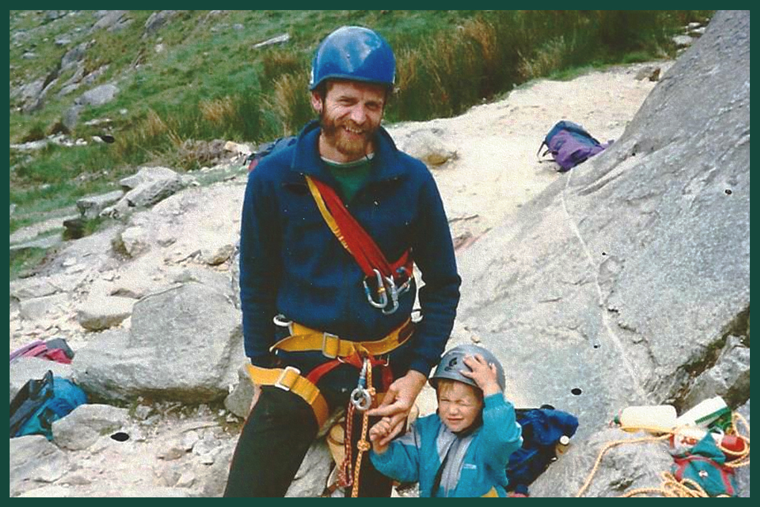 Jesse Dufton as a toddler, standing on a mountain with his father. 