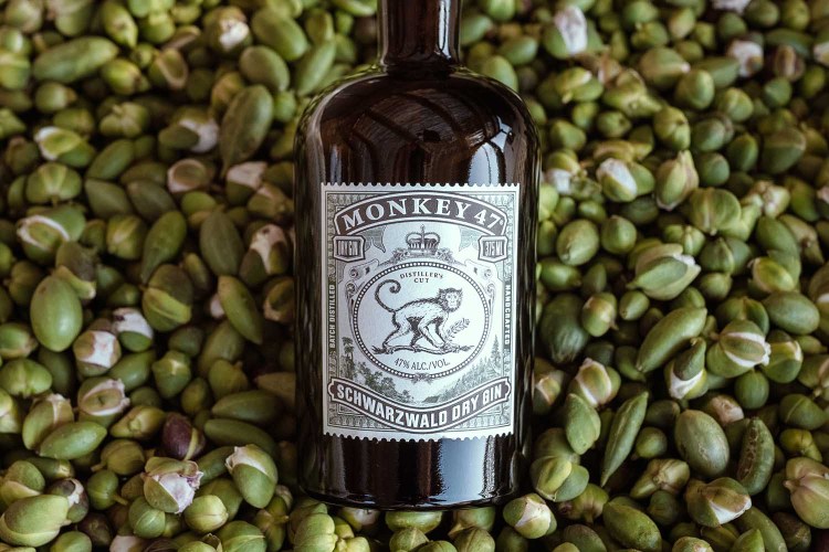 The latest Monkey 47 Disteller's Cut gin on top of a pile of capers