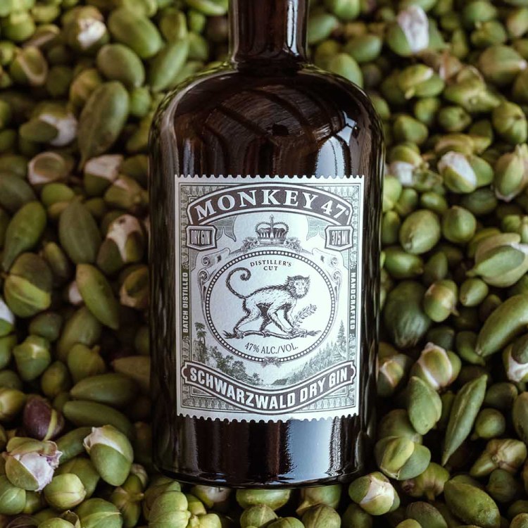 The latest Monkey 47 Disteller's Cut gin on top of a pile of capers