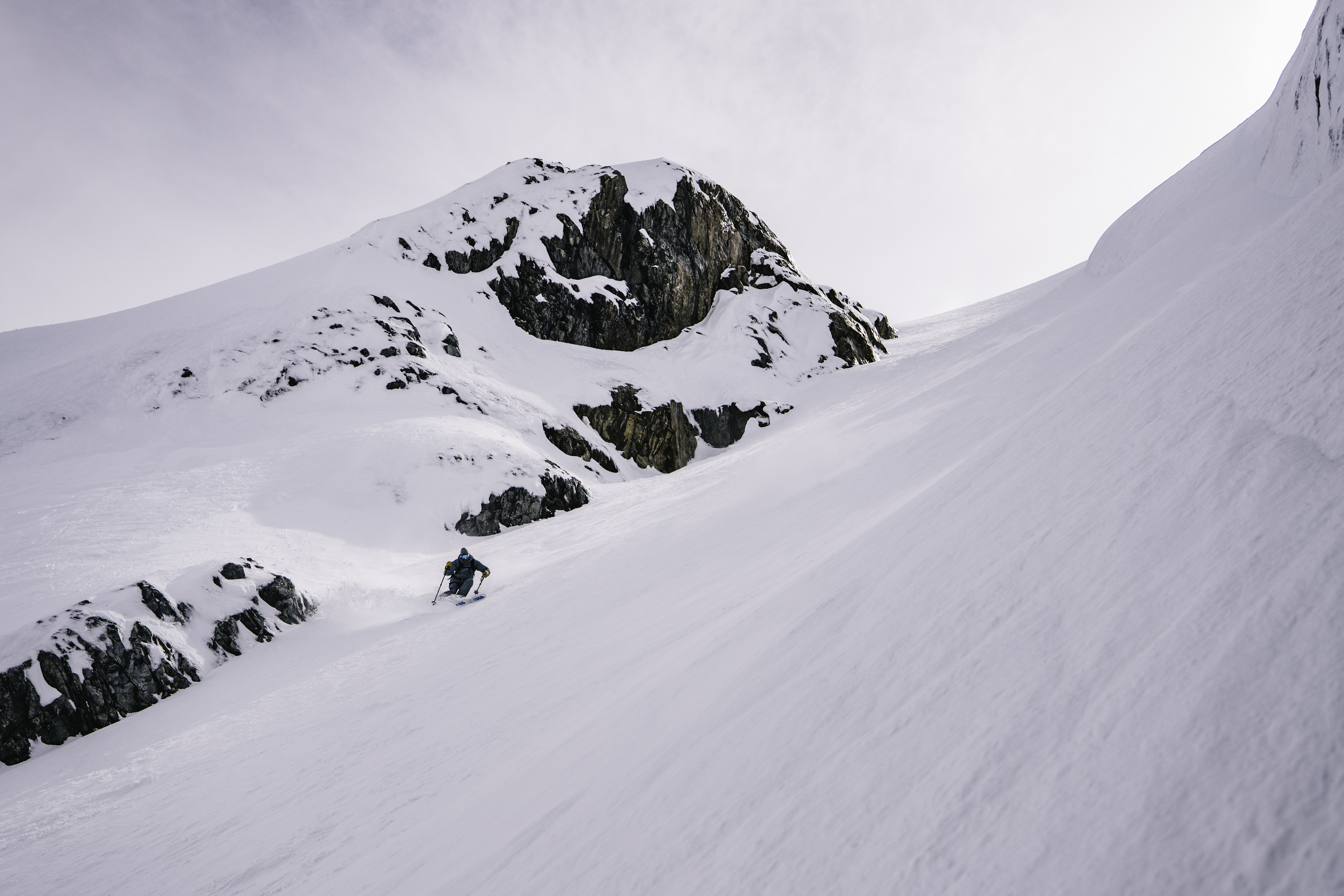 A skier making his way down a mountain in the Andes.