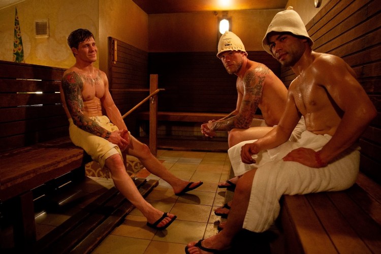 Three men sitting in Banya Russian Sauna