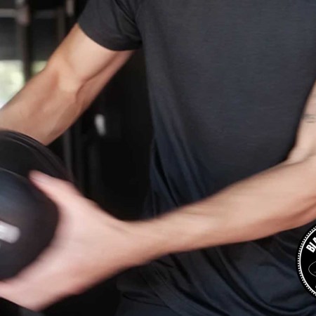 A man working out in Rhone gear.