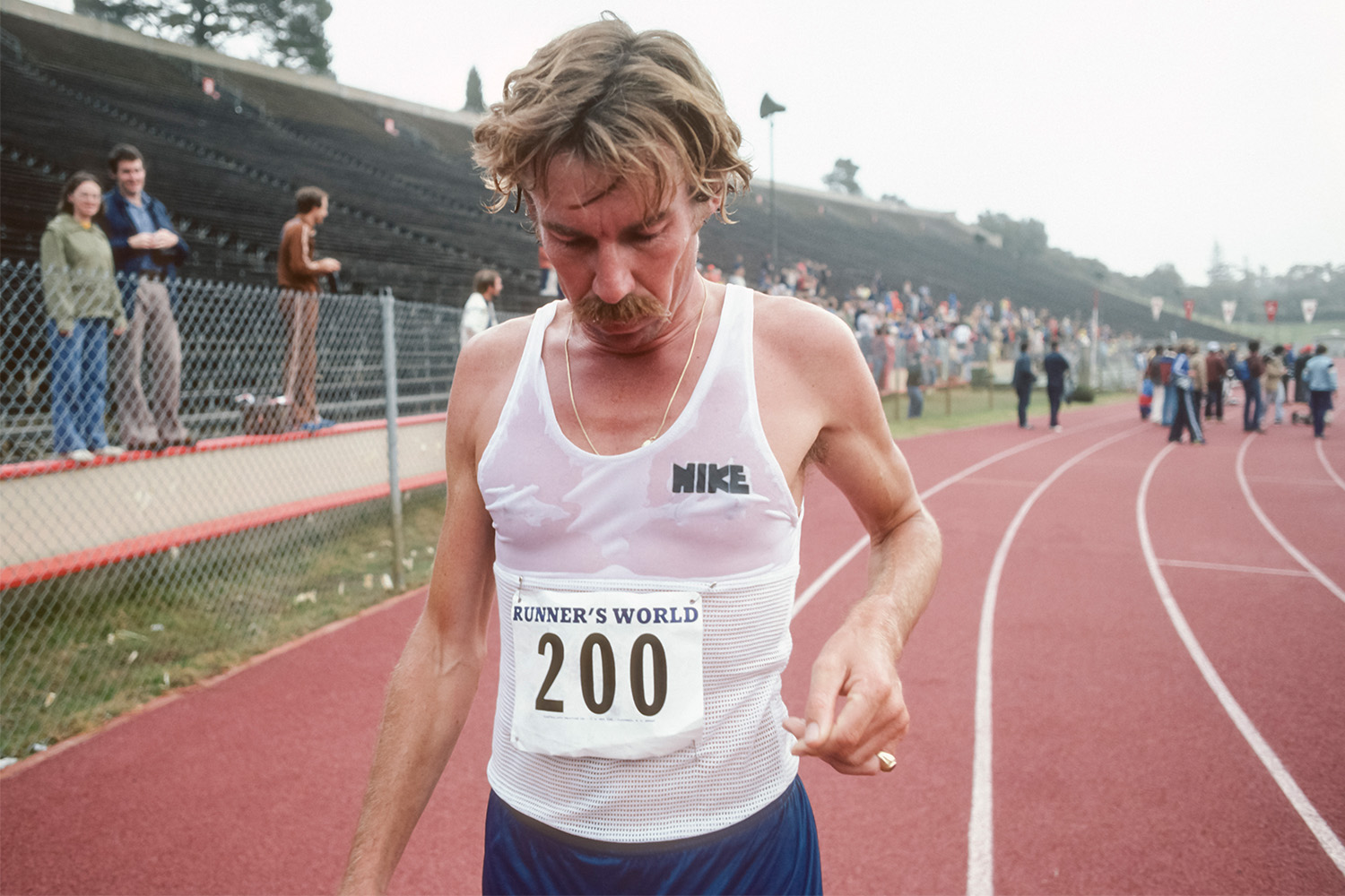 A runner with a drenched singlet, after a race.